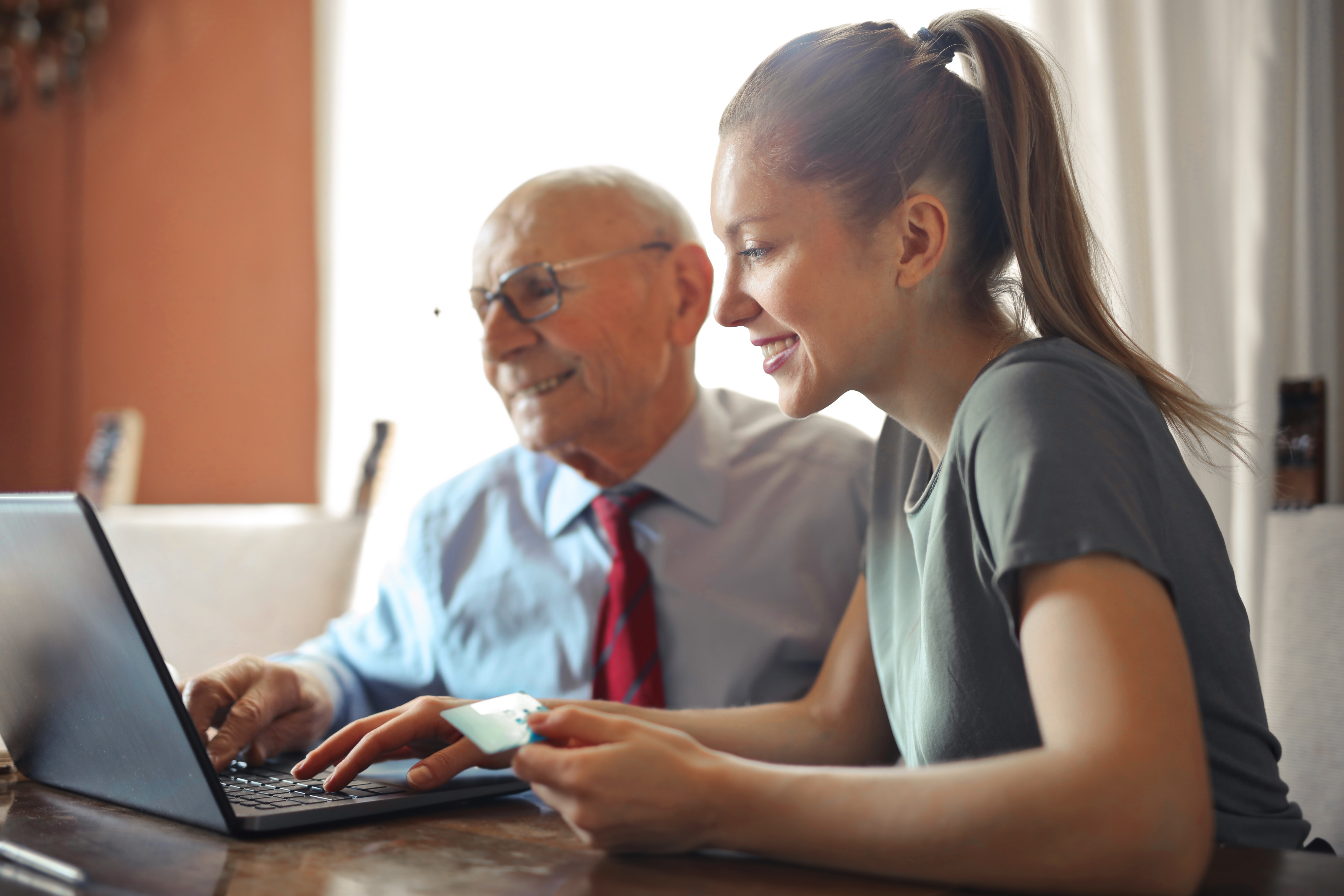 finding stairlifts for seniors on laptop - acorn stairlifts uk